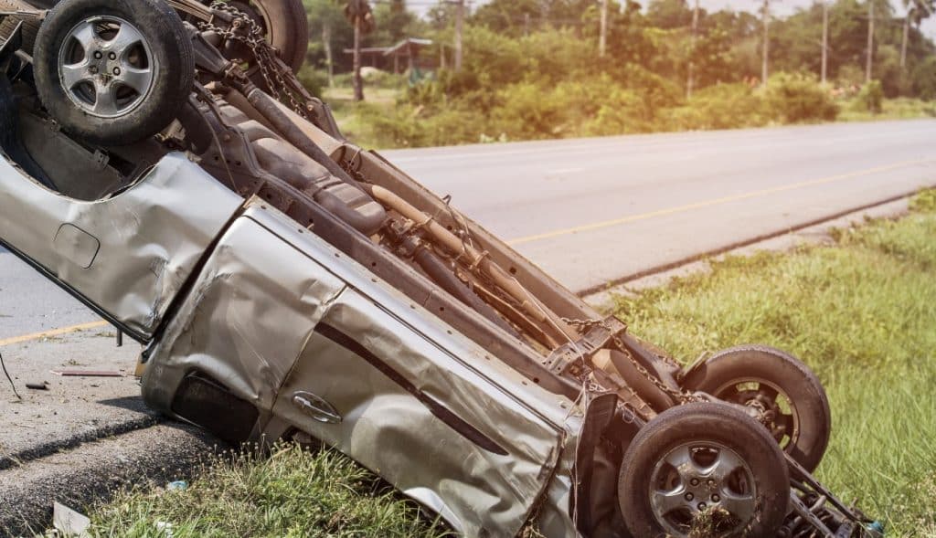 A rollover vehicle accident scene
